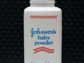 FILE - In this April 15, 2011 file photo, a bottle of Johnson's baby powder is displayed in San Francisco. A St. Louis jury on Thursday, Oct. 27, 2016, awarded a California woman more than $70 million in her lawsuit alleging that years of using Johnson & Johnson's baby powder caused her cancer, the latest case raising concerns about the health ramifications of extended talcum powder use. (AP Photo/Jeff Chiu, File) ORG XMIT: CAET421