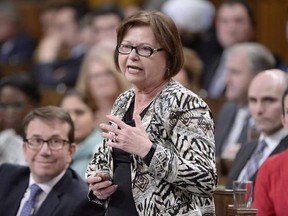 Public Services and Procurement Minister Judy Foote answers a question during Question Period in the House of Commons in Ottawa, Wednesday, Feb.8, 2017. Judy Foote is expected to announce her resignation from the federal cabinet on Thursday. THE CANADIAN PRESS/Adrian Wyld