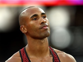 Damian Warner of Canada looks at the results for the men's decathlon Javelin competition on Saturday in London.  Patrick Smith/Getty Images