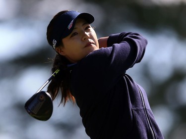 In Gee Chun of Korea watches her drive on the 9th hole during round one of the Canadian Pacific Women's Open at the Ottawa Hunt & Golf Club on August 24, 2017 in Ottawa, Canada.