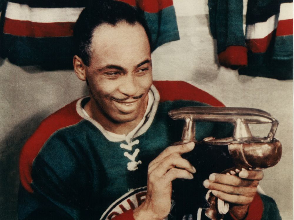 How a financial advisor became the NHL's only active black official
