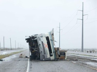A motorhome lies flipped on it's side near Victoria, Texas in the aftermath of Hurricane Harvey on August 26, 2017.