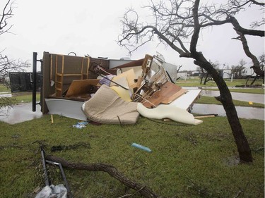 A mobile home lies split open in the Paradise Lagoons RV Resort on August 26, 2017 in Aransas Pass, TX following passage of Hurricane Harvey.