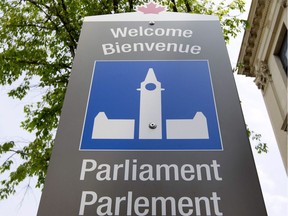 Bilingual sign on Parliament Hill.