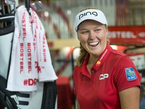 Canadian golfer Brooke Henderson makes a sponsor-related appearance at the Trainyards Golf Town.