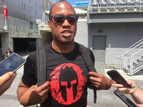 Henry Burris speaks to the media. Photo: Tim Baines