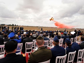 A Royal Moroccan Air Force CL-415 performs for a crowd during the opening ceremonies at the Marrakech Aeroexpo, April 4, 2012. U.S. Air Force photo.