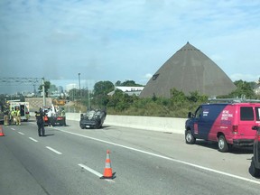 A woman suffered non-life-threatening injuries in this rollover on the Queensway Tuesday morning.