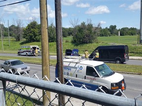 A victim is loaded ito an ambulance following a two-car head-on collision on Greenbank Road Wednesday.