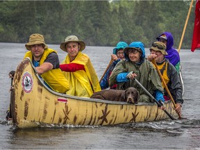 Clive Doucet and his centennial canoeing partners paddled down the Rideau Canal to Ottawa for Canada Day. They had lots of time to think about this country's future. (Photo: David W. Zimmerly)