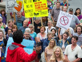 A small group of about 75 protesters still gathered at noon on the York Street Steps beside the US Embassy even though the original demonstration against white supremacy and racism in all its forms was postponed until Wednesday at noon.   Photo Wayne Cuddington/ Postmedia
Wayne Cuddington, Postmedia