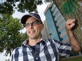 Jason Pollard, a forester with the City of Ottawa, says the peak infestation of emerald ash borer seems to be over. The green mark on the ash tree indicates it has been inoculated against the pest.