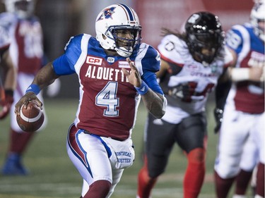 Alouettes starting quarterback Darian Durant runs with the ball in the second quarter. THE CANADIAN PRESS/Paul Chiasson