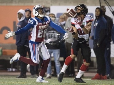 Redblacks wide receiver Greg Ellingson catches a pass in the end-zone for a touchdown in front of Alouettes defensive back Tyree Hollins in the fourth quarter. THE CANADIAN PRESS/Paul Chiasson