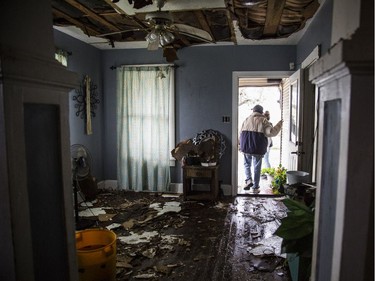 Lucas Garcia walks out of his home in Refugio, Texas on Aug. 26, 2017. Garcia and other family members rode out Hurricane Harvey in a single room in their home.