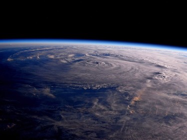 This photo made available by NASA shows Hurricane Harvey over Texas on Saturday, Aug. 26, 2017, seen from the International Space Station.