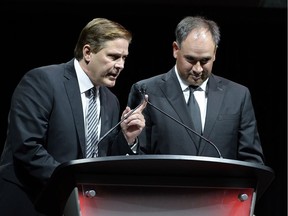 Ottawa Senators assistant general manager Randy Lee tells a story about Bryan Murray as general manager Pierre Dorion, right, looks on, during a celebration of Murray's life at the Canadian Tire Centre on Thursday, Aug. 24, 2017.