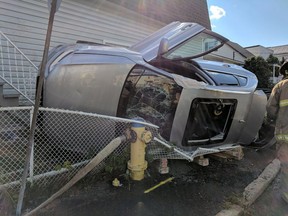 Firefighters had to free a person from a vehicle that had struck a hydro pole and rolled over in the city's east end Sunday.