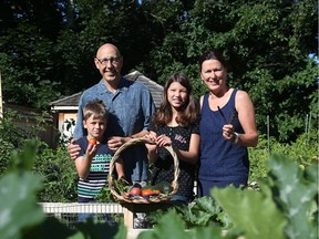 L to R: Conrad Melanson, Luca Gervais, Marianne Gervais and Anne-Marie Gervais have turned their typical backyard into an incredible vegetable garden