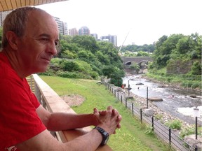 Ottawa River Runners Whitewater Club president Doug Corkery overlooks the Pumphouse course from the balcony of the club's new boat storage facility and clubhouse.