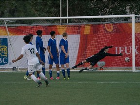 Ottawa's Monti Mohsen and four Alberta defenders watch as Mohsen's free kick beats the goalkeeper for the only goal of the game in the Canada Summer Games soccer final on Saturday night. Marlene Stirrett-Matson/Team Ontario