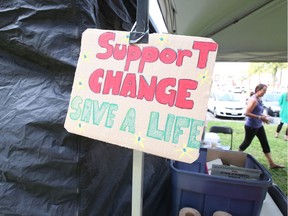 A sign hangs at the pop-up injection site in Ottawa on Friday, Aug. 25, 2017.