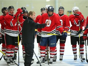 Assistant coach Mario Duhamel talks to 67's players during a training camp session at the University of Ottawa. Jean Levac/Postmedia