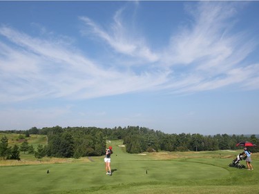 Chloe Currie tees off from the 16th hole.