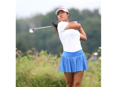 Susan Xiao  hits her tee shot on the fourth hole.