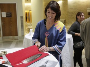 Ontario Court Justice Celynne Dorval shows the eagle's feather that will be present at all proceedings at Ottawa's first Indigenous People's Court.