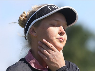 2017 Canadian Pacific Women's Open Championship opening round took place at the Ottawa Hunt and Golf Club in Ottawa Ontario Thursday Aug 24, 2017. Smith's Falls Brooke Henderson reacts after getting a bogey on number 9 during Thursday's round.
