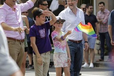 Prime Minister Justin Trudeau's son Xavier and daughter Ella-Grace marched through Centretown in Ottawa's Capital Pride parade on Sunday, Aug. 27, 2017. (David Kawai)