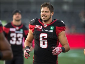 Antoine Pruneau warms up before the Redblacks' home game against the Eskimos at TD Place stadium on Thursday night. Wayne Cuddington/Postmedia