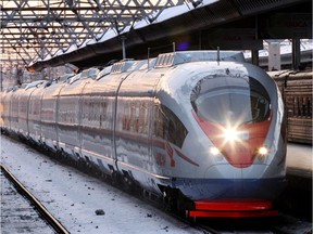 It's Russia: Take the train. The high-speed train named Sapsan moves along the tracks at a station in Saint-Petersburg, in this file shot.