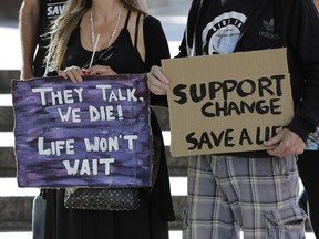 A group of activists say they're planning to open an unsanctioned "pop up" drug injection site in Ottawa to combat the city's overdose problem. Ottawa Overdose Prevention volunteers spoke to media in front of the Human Rights Monument about the importance of such services, in Ottawa on Aug. 24, 2017. (David Kawai)

127378
David Kawai