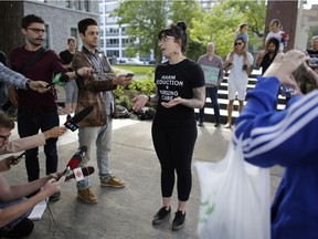 Ottawa Overdose Prevention volunteers, such as registered nurse and University of Ottawa professor Marilou Gagnon, spoke to media in front of the Human Rights Monument about the importance services like pop-up safe injection sites, in Ottawa on Aug. 24, 2017.