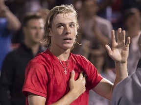 Denis Shapovalov of Richmond Hill, Ont.,. waves to the crowd as he walks off the court after losing to Alexander Zverev on Saturday night in Montreal. THE CANADIAN PRESS/Paul Chiasson