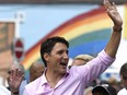 Prime Minister Justin Trudeau marches in the Ottawa Capital Pride parade on Sunday, Aug. 27, 2017.