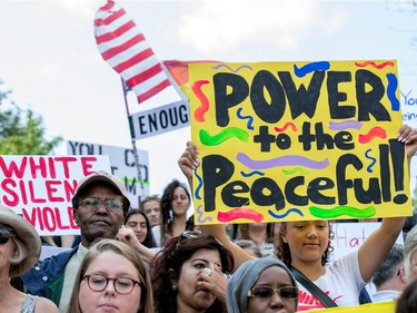 About 700 demonstrators took part in a noon time anti-racism protest in front of the US embassy in Ottawa. The peaceful demo was to voice their opinions against white supremacy and racism in all its forms.   Photo Wayne Cuddington/ Postmedia
Wayne Cuddington, Postmedia