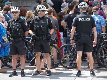 Plenty of police presence as about 700 demonstrators took part in a noon time anti-racism protest in front of the US embassy in Ottawa. The peaceful demo was to voice their opinions against white supremacy and racism in all its forms.   Photo Wayne Cuddington/ Postmedia
Wayne Cuddington, Postmedia