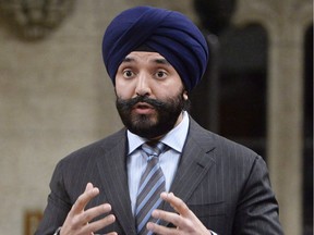 Innovation, Science and Economic Development Minister Navdeep Singh Bains responds to a question during Question Period in the House of Commons in Ottawa, Thursday, Feb.23, 2017. The Trudeau government is opening the competition for its $950-million "supercluster" program that aims to bring together industry and academia as a way to lift the innovation economy. THE CANADIAN PRESS/Adrian Wyld ORG XMIT: CPT132

Feb.23, 2017 file photo
Adrian Wyld,