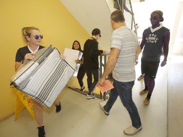Students move into residence at Carleton University in Ottawa on Saturday, Sept. 2, 2017.