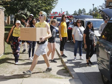 Students move into residence at Carleton University in Ottawa on Saturday, Sept. 2, 2017.