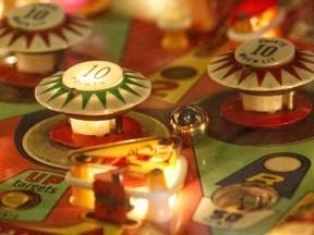 Players take part in Canada's longest running pinball expo at the Nepean Sportsplex in Ottawa on Saturday, September 2, 2017.