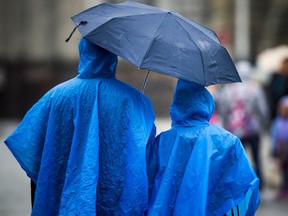 The wet weather Sunday September 3, 2017 didn't stop people from getting out to enjoy the long weekend in Ottawa. Umbrellas were out along with ponchos and raincoats for people doing the tourist thing on Parliament Hill.