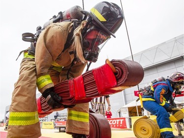 Shawna Coulter, from the Whitby Fire Department, competes in the opening heat.