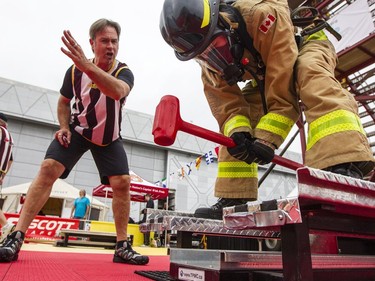 Shawna Coulter, from the Whitby Fire Department, competes in the opening heat.