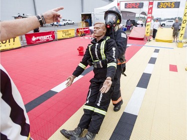 Kathryn Harding, from the Bruce Power Fire Department, competes on Day 1.
