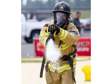 The Ottawa Fire Department's Keith Rigby, competes in the opening day of the FireFit championships.