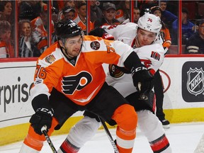 Chris VandeVelde, then with the Flyers, battles for position with Senators defenceman Mark Borowiecki during a game at Philadelphia in March. Bruce Bennett/Getty Images